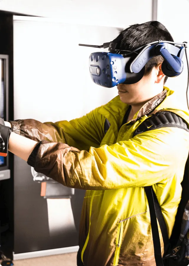 A worker using the VR equipment for training purposes.